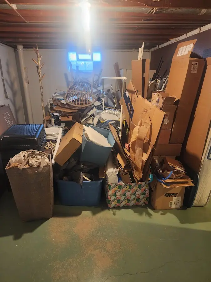 Roll-off dumpster container at job site for 8 Yard Dumpster Rental in Moultonborough